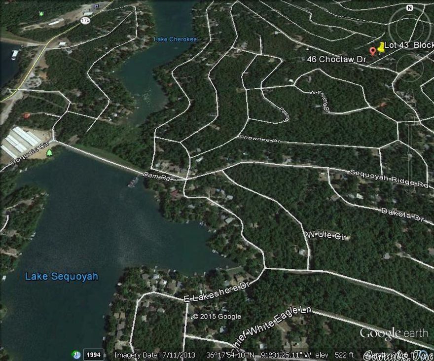 vacant lot with power and water at the road.  Sits near Lake Sequoyah access at Shawnee Park, and town center. Lot gives access to all local amenities including 7 lakes and 2, 18 hole golf courses, 2 community centers, pools, beach, hiking trails, etc.