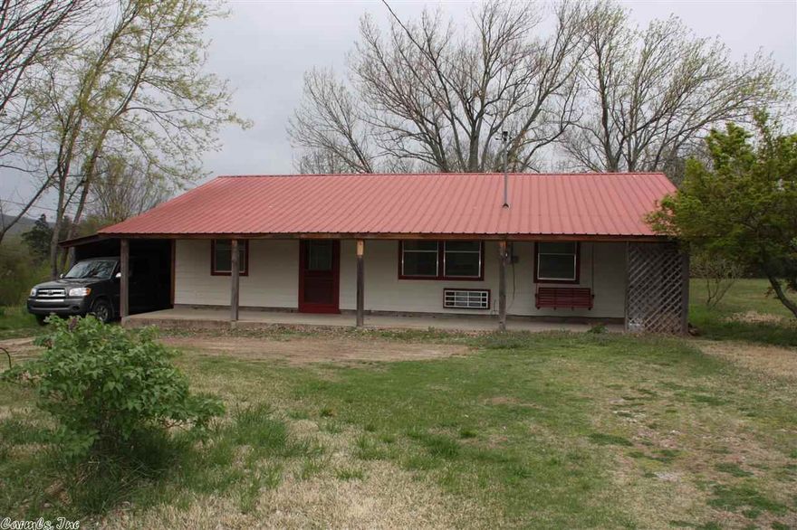 Perfect home for first time home buyers or rental property.  Walk to the courthouse square from this location and enjoy all that Mountain View has to offer or just sit in the porch swing and relax.  This home has a metal roof and a small yard which both require little or no maintenance.   There are ceiling fans in every room.  There is a  laundry room off the kitchen with washer and dryer connections.  Also on the property is a small portable storage building.