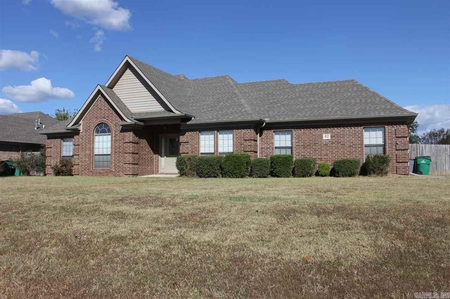 This 3 bedroom 2 bath brick home with dining room sits on a large coner lot.  The large backyard is perfect for children to play.  Close to Little Rock Air Force Base