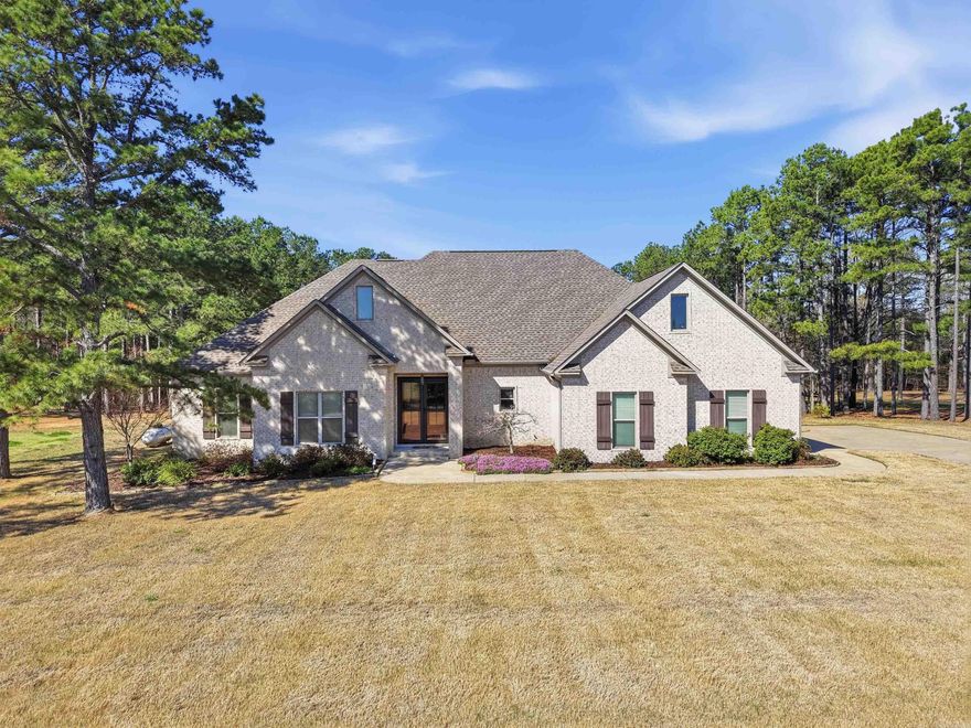 Welcome to 83 Watson Lane in Greenbrier, Arkansas, an IMMACULATE, LIKE NEW home in a peaceful country setting while still close to the conveniences of Conway and the highly rated Greenbrier School District. Buyers searching for updated homes in Greenbrier AR with space, comfort & outdoor living will appreciate everything this property offers. This 4 bedroom, 2.5 bathroom home features an open floor plan designed for both everyday living & entertaining. The kitchen includes a walk in pantry and flows into the main living area. Luxury vinyl, tile, & carpet flooring provide both style & durability. The primary suite offers a relaxing retreat w/ dual vanities, walk in shower, and a freestanding soaking tub. A walkthrough primary closet connects directly to the laundry room for added convenience. Step outside to a screened back porch w/ a bed swing, the perfect place for coffee or to unwind. The property also features an enclosed garden space for those who enjoy gardening. The garage includes a charger for an electric vehicle. Located in a desirable Greenbrier neighborhood, this home offers country living with modern convenience. Schedule a tour today and see why this home stands out.