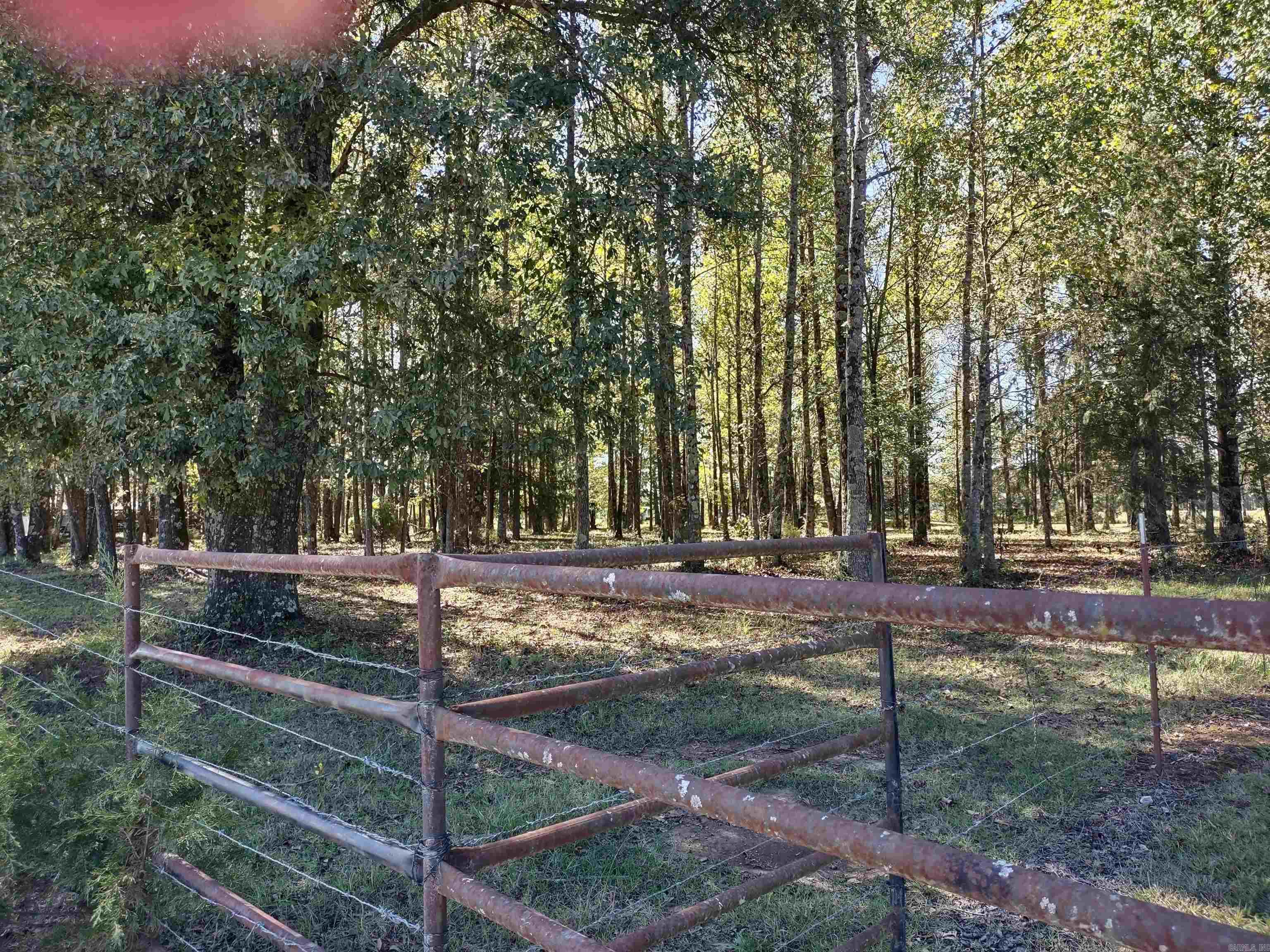 Just 5 short miles from the city limits of Beebe country living! Beautiful home site with nice trees. Fully fenced! Mineral rights do not Convey. A new survey is on file and a perk test has been completed. Modular homes welcome, less than 4 years old and on a permanent foundation. This property is in the flood zone.