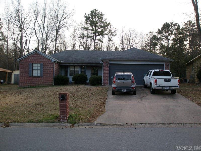 Spacious split floor plan, 1 level home, separate bonus room with gas log fireplace, central family room with new wood look laminate flooring, master has double vanity, jetted tub, eat-in kitchen has large breakfast bar built in oven, microwave and dishwasher. Laundry room at 2 car garage entrance, tile in all wet areas, .23 of an acre level, fully fenced lot. 2015 New flooring, water heater and disposal. Walking distance to neighborhood playground.