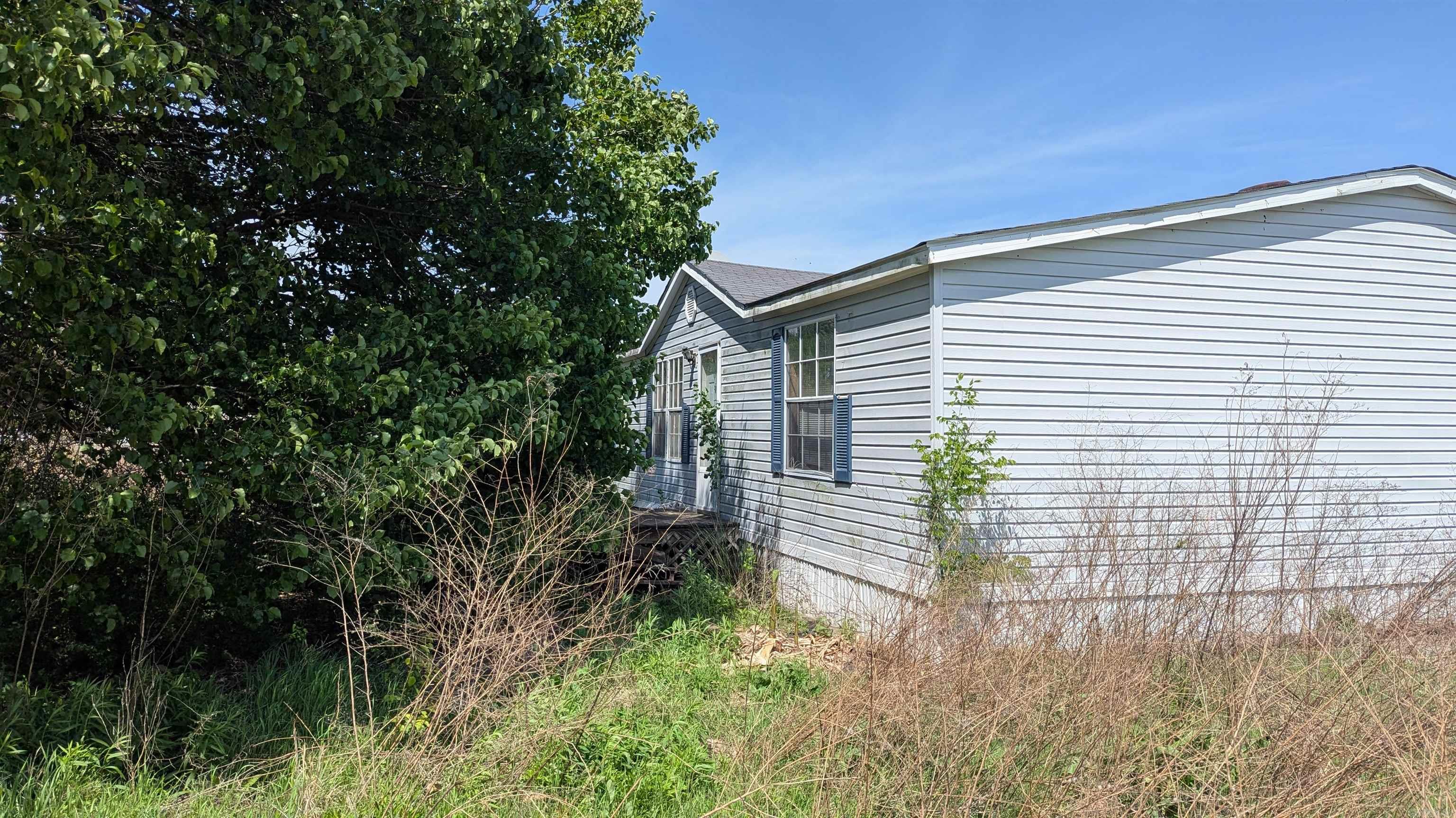 Great fixer upper, needs new roof and there is water damage in the master bath but still a great rural property located on 3.19 acres! Large rooms and is a true gem in the rough. There is mold present and a hold harmless must be signed before showing. AGENTS PLEASE READ THE AGENT REMARKS!!!!!!!!!
