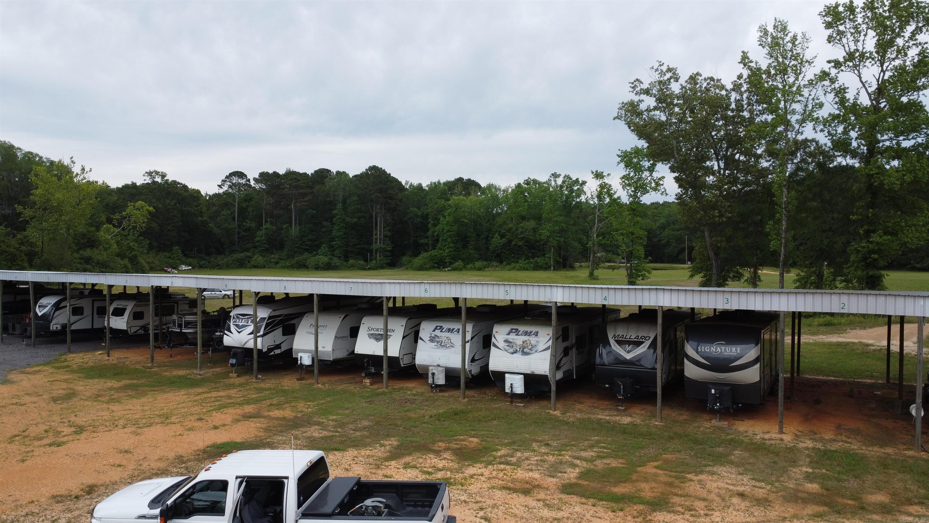 Owner retiring. Great business opportunity for a new owner. Newly completed storage facility. 10x10 enclosed and covered camper/boat storage. Don't miss this opportunity.