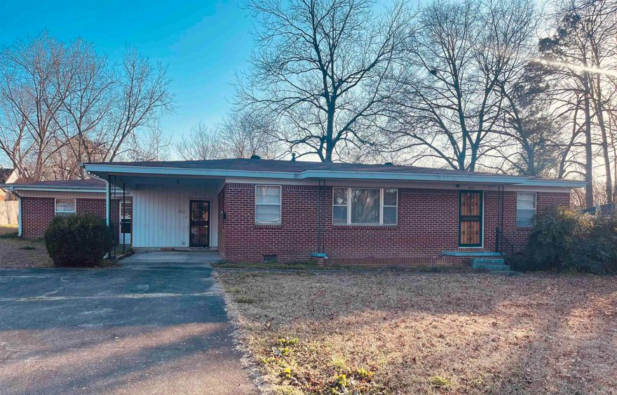 Well-maintained brick home offering 2,084 sq ft of living space and a functional layout. Features include a walk-in shower, newer roof, one-car carport, and outside storage. Property includes secondary living space with a full bath and private entrance, providing excellent flexibility for guests, extended living, or potential rental use. Situated on a large lot with plenty of room to enjoy outdoor space. This versatile property offers comfort, space, and opportunity. Schedule your showing today!