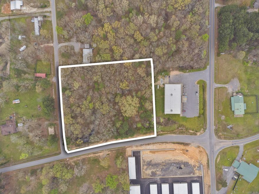Flat land at intersection of Lawson and Congo-Ferndale road! Platted for commercial and sitting right next door to Dollar General, this property would be perfect for Storage Units, Gas Station, or possibly multi family housing. All utilities available at street. Take advantage of a great opportunity in this growing area!