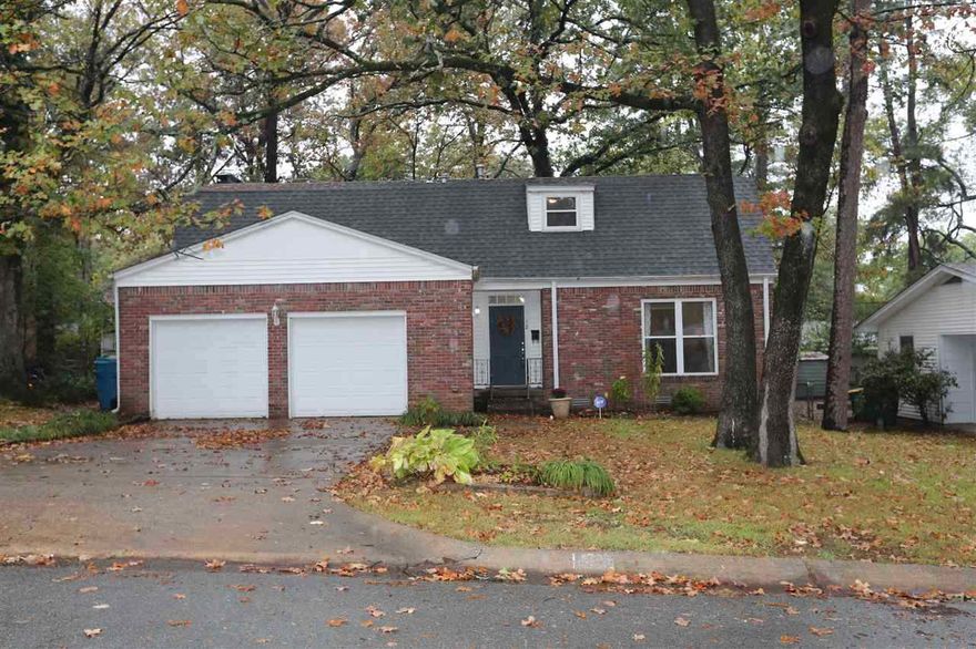 Updated in 2011 this 4 Bedroom 2.5 bath home is  ready to move right in.  Hardwood flooring in all rooms except kitchen and baths.  It has a spacious living room, separate dining, large kitchen and breakfast area plus a den with woodburning fireplace. The  bedrooms  have an abundance of closet space and nice updated baths. The kitchen is complete with granite counters, stainless steel appliances and beautiful stained cabinets.  Fully fenced backyard. 2 car garage.