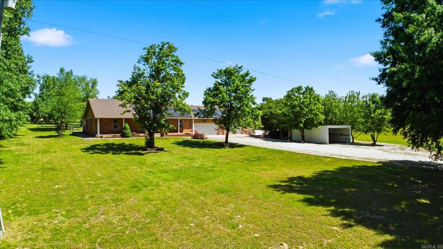 Nestled on approximately 5± acres in the highly sought-after Brookland School District, this 3-bedroom, 2-bath home offers 2474 of space, privacy, and versatility. A rare layout features two primary bedrooms, both with walk-in closets, ideal for multi-generational living or added privacy. Each bathroom is thoughtfully designed with walk-in tile showers, and one bath also includes a large soaker tub for added comfort. The functional floor plan offers inviting living spaces and a kitchen equipped with a gas stove and stainless steel appliances. A large garage and a large workshop attached to the home provides excellent space for hobbies, storage, or a home-based business. Outside, the expansive 5± acres offer endless possibilities while remaining conveniently close to town amenities. Home has been recently painted with fresh neutral paint throughout.  A unique opportunity combining land, storm shelter, location, and functionality. Call today for your private tour!