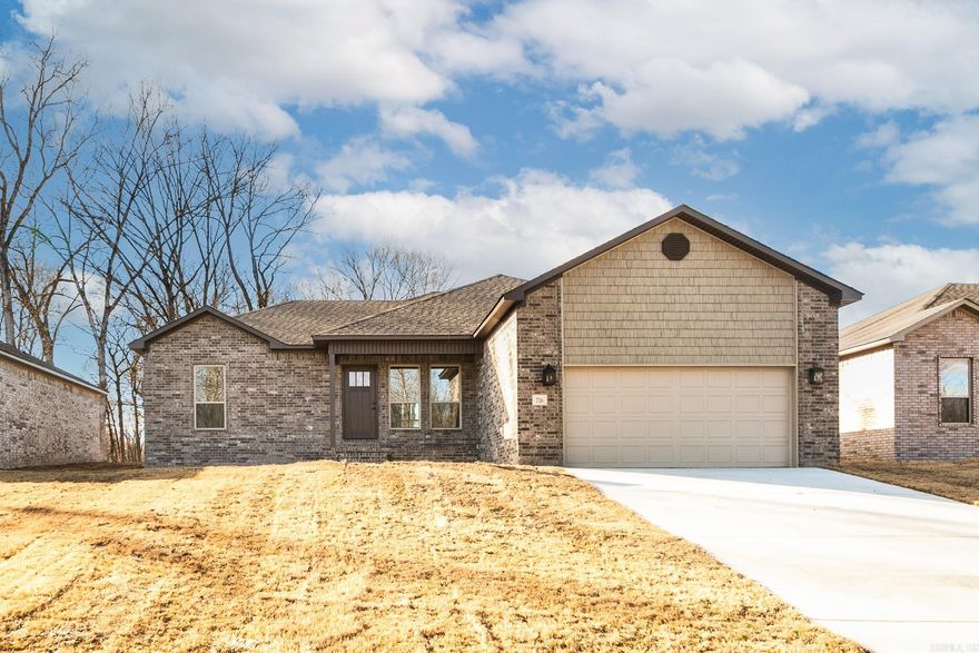 Country living with city convenience! Discover the perfect blend of tranquility and accessibility with this stunning new construction all-brick home, ideally situated for those who cherish the peace of country living yet desire the conveniences of the city. This spacious home offers 4 bedrooms and 2 baths, providing ample space for family and guests. The island kitchen is a chef's dream, featuring granite countertops, painted cabinets, extra trim, and a stylish backsplash. You'll also love the abundance of storage space, perfect for stocking up your pantry. Enjoy the spa-like walk-in tile shower and double vanities, offering a touch of elegance and functionality. Equipped with cabinets, the convenient laundry room provides both convenience and additional storage. Experience the beauty and durability of luxury vinyl flooring throughout the home — no carpet, ensuring low maintenance and a modern look. Please note that this home is currently under construction, allowing you the opportunity to envision your future in this beautiful space.  Make it yours today!