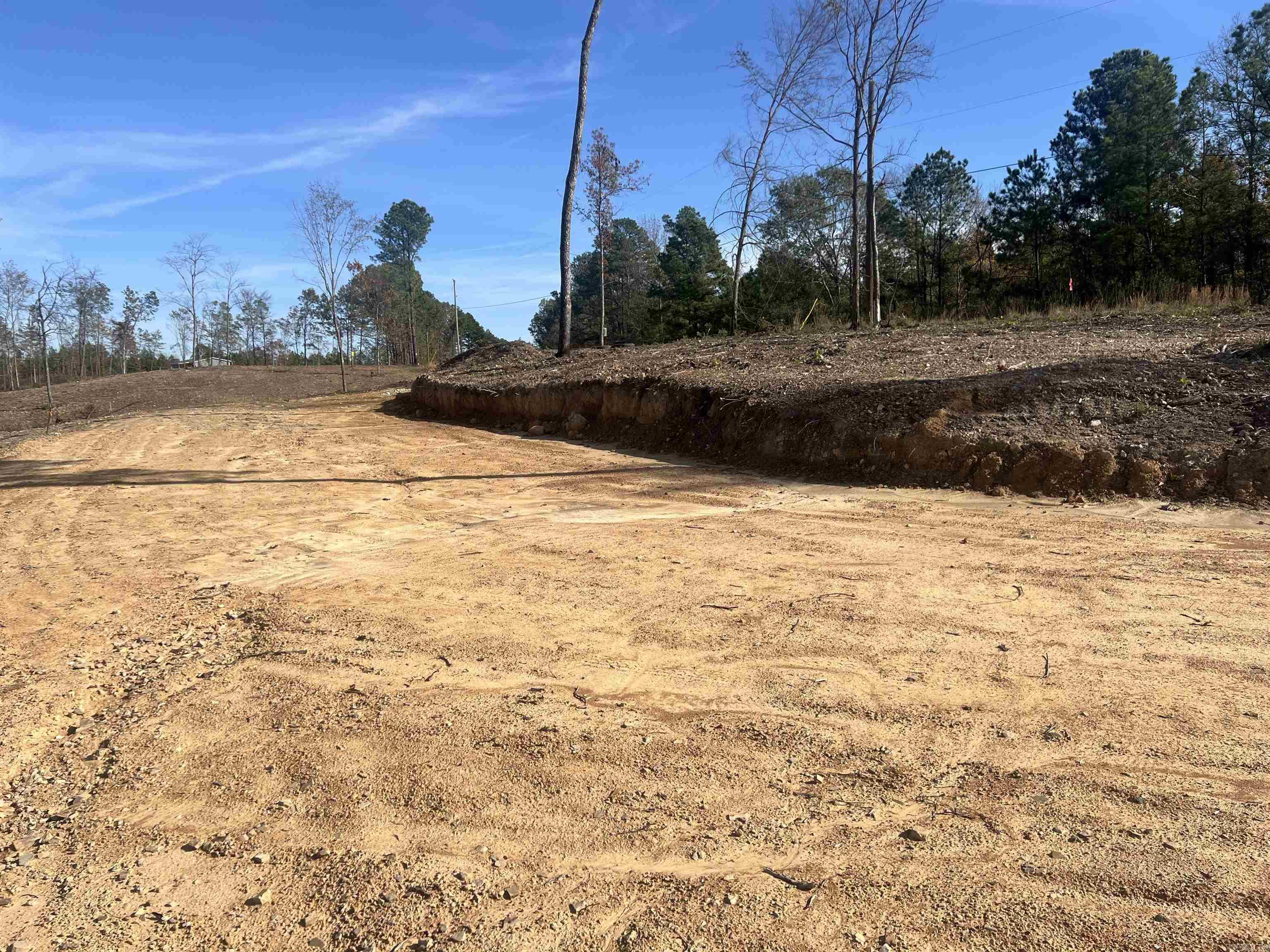 Beautiful Homesite Available! Partially cleared, ridge top views, Hwy 84 road frontage with utilities at the road. Lenox Marcus Recreation Area on Lake Degray is only a few miles away. Deed Restriction apply. Tract C