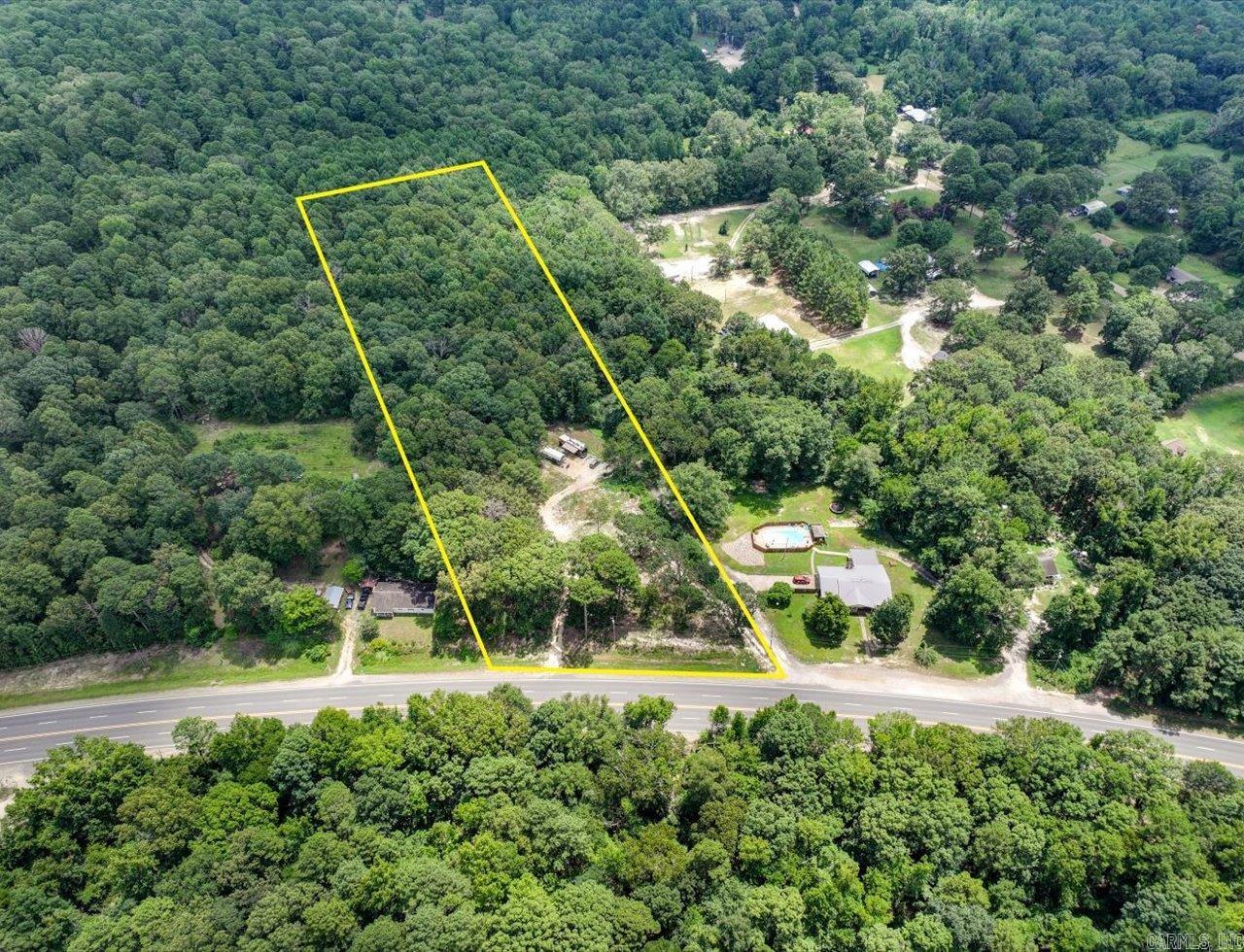 Amazing site for building your dream home in the Glen Rose school district on US HWY 67. Approximately 5 acres with electric and septic already on site. Front acre is cleared, with the rest being wooded. Don't miss a great opportunity! No restrictions! This property won't last long. *Agents-see showing remarks.