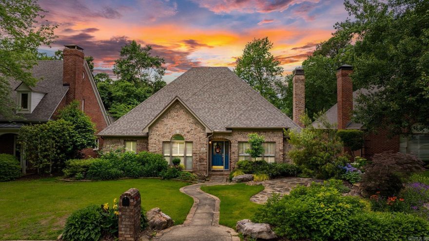 Fabulous one story all brick home that has been wonderfully maintained and updated. Lush landscaping, stone pavers and enchanting waterfall enhances the beautiful fully fenced exterior. Easy to live and entertain in the large light filled living space with gas fireplace, central formal dining room and wet bar. Hardwood floors in living areas & bedrooms. Plantation shutters throughout. Newly updated kitchen features informal dining area, desk, pantry, gorgeous granite counters, stainless steel appliances including beverage fridge, wall oven, downdraft electric range and dishwasher. Primary suite is spacious with spa bath, two closets and walk in shower. Two guest bedrooms, hall bath and Laundry. Two car garage with large storage room. New sprinkler system, garage door opener, roof-2022, HWH-2022, HVAC-2022, new paint in 2023. Come See!