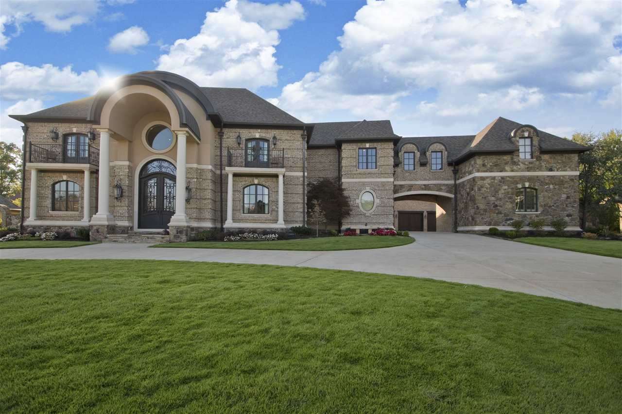 Premier custom built home in the gated Sologne neighborhood of Chenal Valley. This home has it all. Porte Cochere leads to four plus garages. Gorgeous hardwood flooring. Impressive two story entry with curved staircase. Wine cellar. Banquet sized dining room. Incredible chef's kitchen with two islands. Movie theater. Bonus room. Full wet bar. Butlers pantry. Relaxing veranda with fireplace. The geothermal units keeps costs down. Electricity $300-$60. Gas less than $100