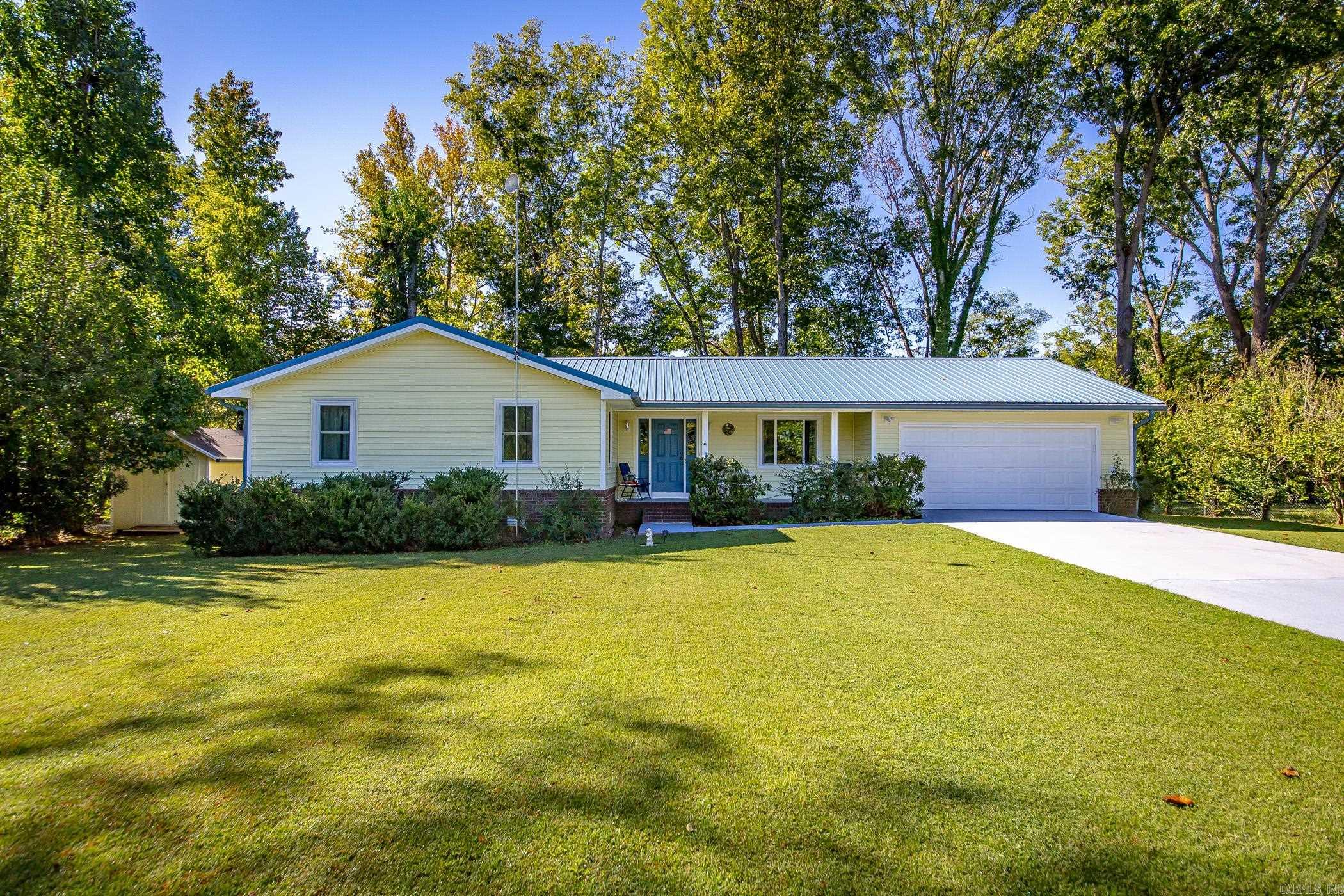 Beautifully Upgraded Riverfront Home!! Move-in ready with modern upgrades and serene riverfront Living! This stunning home offers the perfect blend of comfort, style, and function- featuring 850sq ft addition, new roof, vinyl siding, and custom rockwork on the riverside for impressive curb appeal. Interior highlights are spacious open layout with Hayes River Oak 12mm laminate flooring, Quartz countertops in kitchen and coffee bar. Low-E insulated windows and all-wood kitchen cabinets with soft-close doors/drawers and multiple Lazy Susans. Gas Hot Water Heaters and stove. Stain resistant carpet in all three bedrooms and tile flooring in all bathrooms. Outdoor shed included and yard is fenced so bring your pets. Central heating/cooling and a cozy wood burning stove. This home checks all the boxes- location, quality upgrades and lifestyle. Don't miss the opportunity to own this turn-key riverfront retreat! Call today to schedule a private showing!