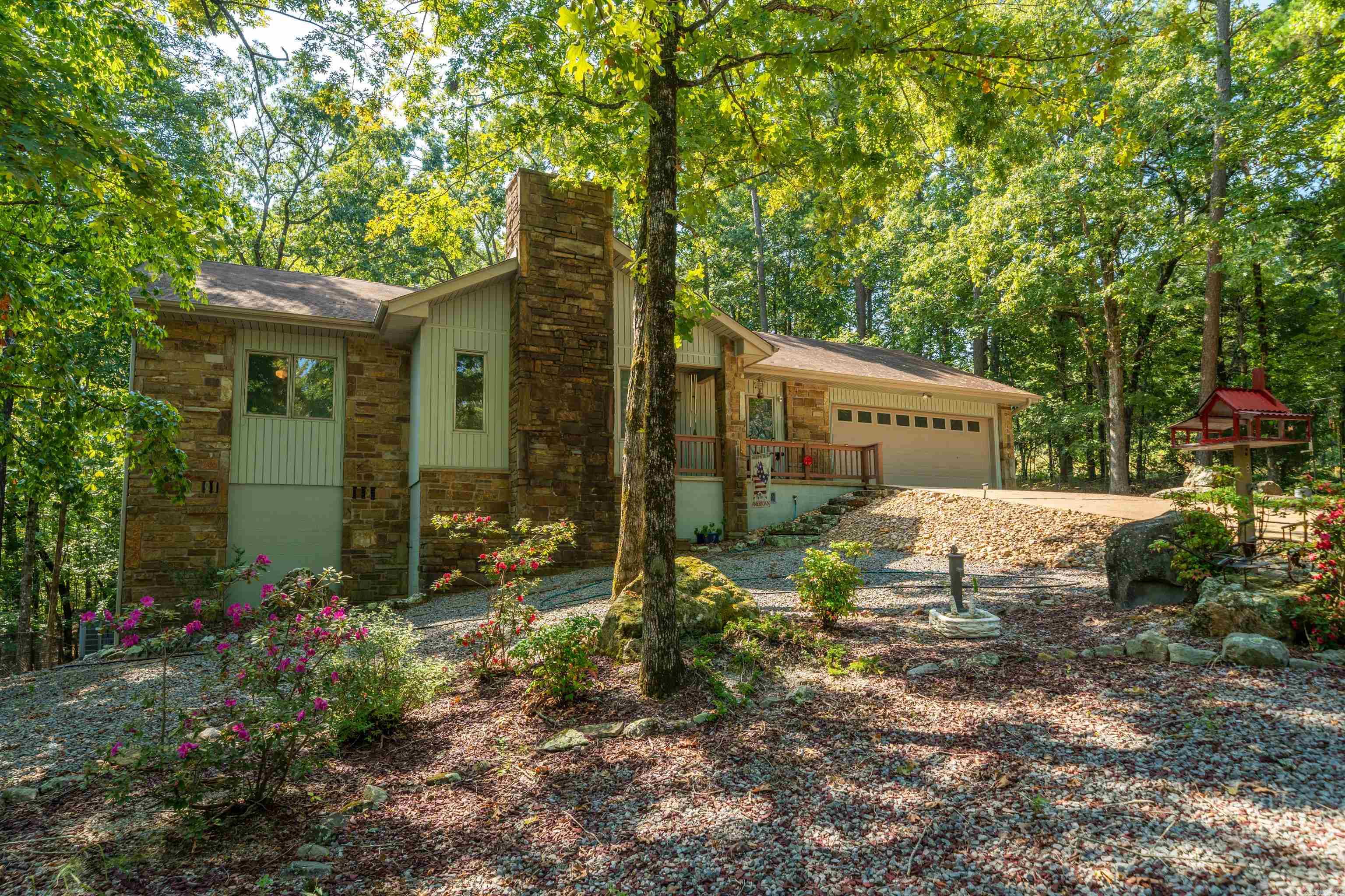 Welcome to your peaceful retreat in Hot Springs Village, the largest gated community in North America, known for its stunning natural beauty, world-class amenities, and strong sense of community. This home offers the perfect blend of comfort, charm, and convenience. Inside, you'll find cozy living spaces, filled with natural light and warm finishes that make you feel instantly at home. Whether you're sipping coffee on the front porch or enjoying a quiet evening by the fireplace, every detail is designed for relaxation. Step outside and enjoy all that Hot Springs Village has to offer—11 lakes, 9 golf courses, 30+ miles of hiking trails, a full-service fitness center, and year-round community events, with 24/7 security and a strong emphasis on lifestyle and leisure, it’s more than just a home—it’s a way of life.
