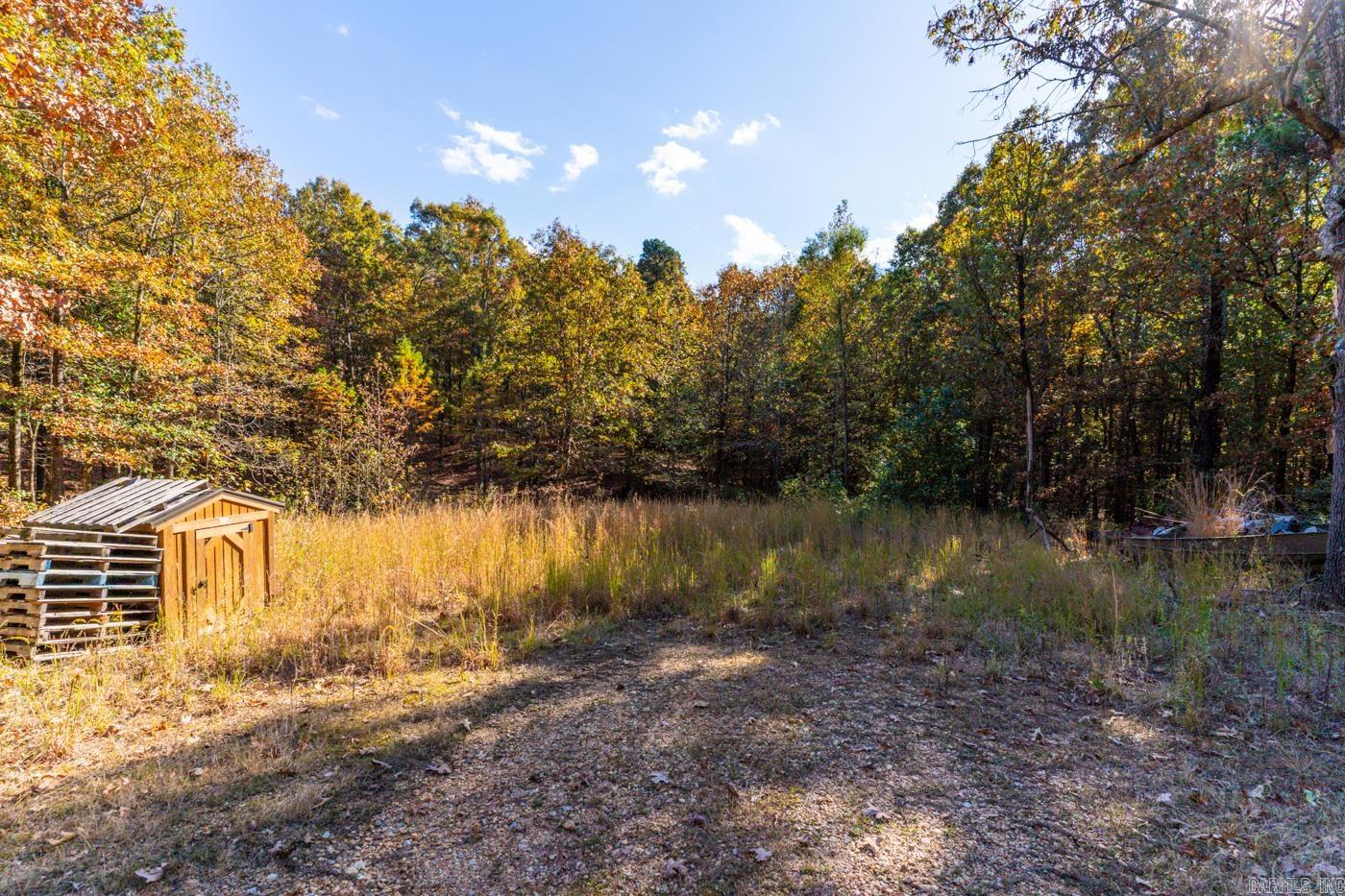 Welcome to market 565 Greene Road located in the lush woodlands on the outskirts of Marmaduke. This special property is lush with beautiful trees, and foliage. The perfect spot to build your dream cabin, or future home. This 5 acre tract boasts a well already onsite, ensuring a convenient and reliable water source, along with power poles on the road. Fantastic internet available. A perfect spot to set up camp, with its lush surroundings, and abundant wildlife. Whether you're a nature enthusiast, or simply seeking a peaceful sanctuary, this land provides the ideal setting. There is a small pond on the land. This is a rare opportunity to own a slice of Arkansas wilderness. Don't miss your chance to make your woodland dreams come true! Priced to sell!! There is a survey available.