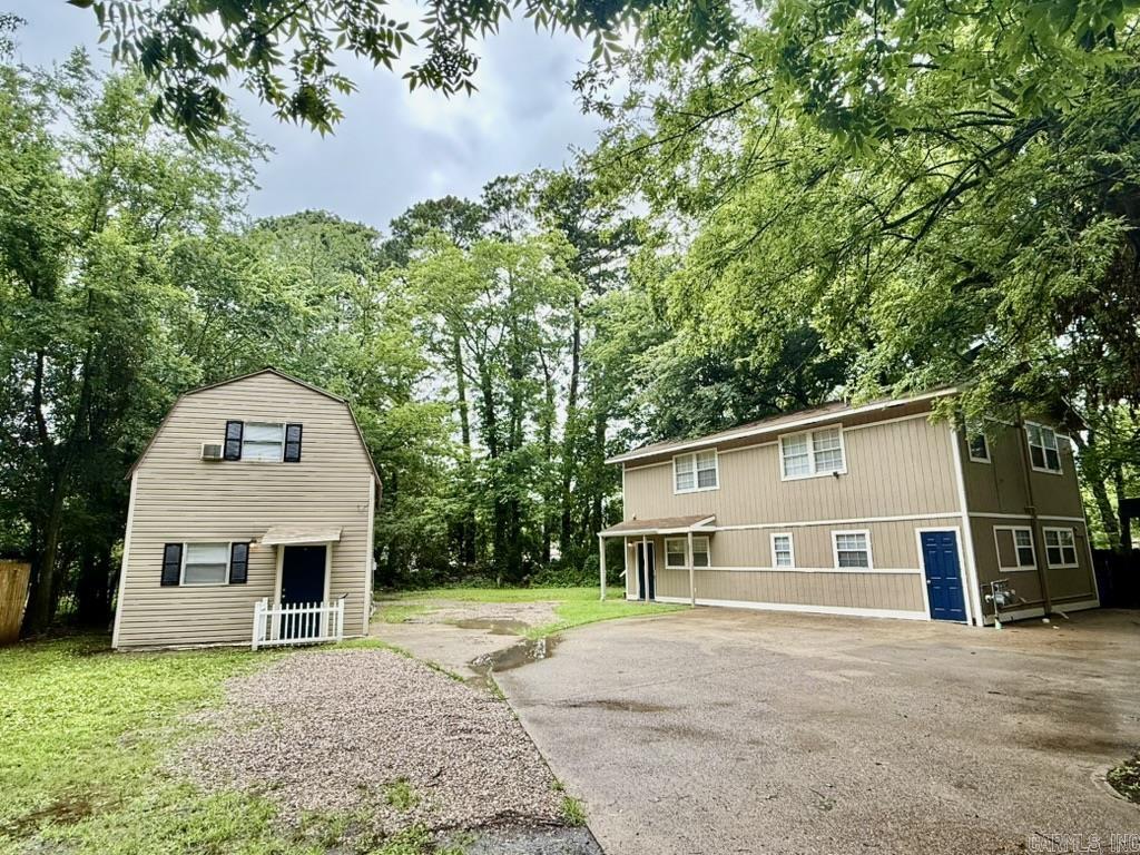 Property consists of one, 2-story duplex and 1 separate house, all on one property: ⢠Duplex (2 units - 1 upstairs, 1 downstairs): each unit - 960 sq. Feet (1,920 square feet total). ⢠House: 972 sq. Feet. (The square footage on county records is wrong.) ⢠Total square feet, 3 units: 2,892 square feet This property has a $3,000 or more per month income potential (3 units) and all units are newly remodeled and rent ready. Perfect for an owner who wants to either rent all 3 units or live in the separate house and rent the duplex units to pay expenses. Duplex: Each unit (2) is 2 bed/1 bath, central heat (gas)/window ACs. Both units newly remodeled - all new paint, cabinets, flooring, cookstoves (1 gas/1 electric), refrigerators and islands. All stay. Washer/dryer hookups in both units. House: 2 bed/1 bath, electric heat and ac unit downstairs (similar to mini split unit). Upstairs has new electric baseboard heaters and window ACs. Newly remodeled. New paint, flooring, refrigerator & cookstove. All stay. All electric. Metal roof. Washer/dryer hookups. Agents See Remarks