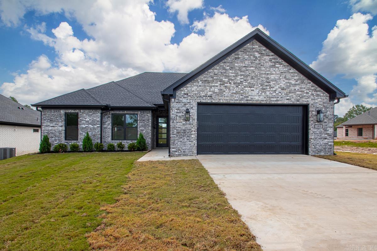 This beautiful new construction home features 4 bedrooms, 2 bathrooms, and stylish custom finishes throughout. Enjoy an open layout with a cozy brick fireplace, a spacious kitchen, and a generous laundry room. The primary suite offers a relaxing retreat with a well-appointed bath and walk-in closet. Situated on a flat lot, the home also includes a covered back patio—perfect for outdoor living.