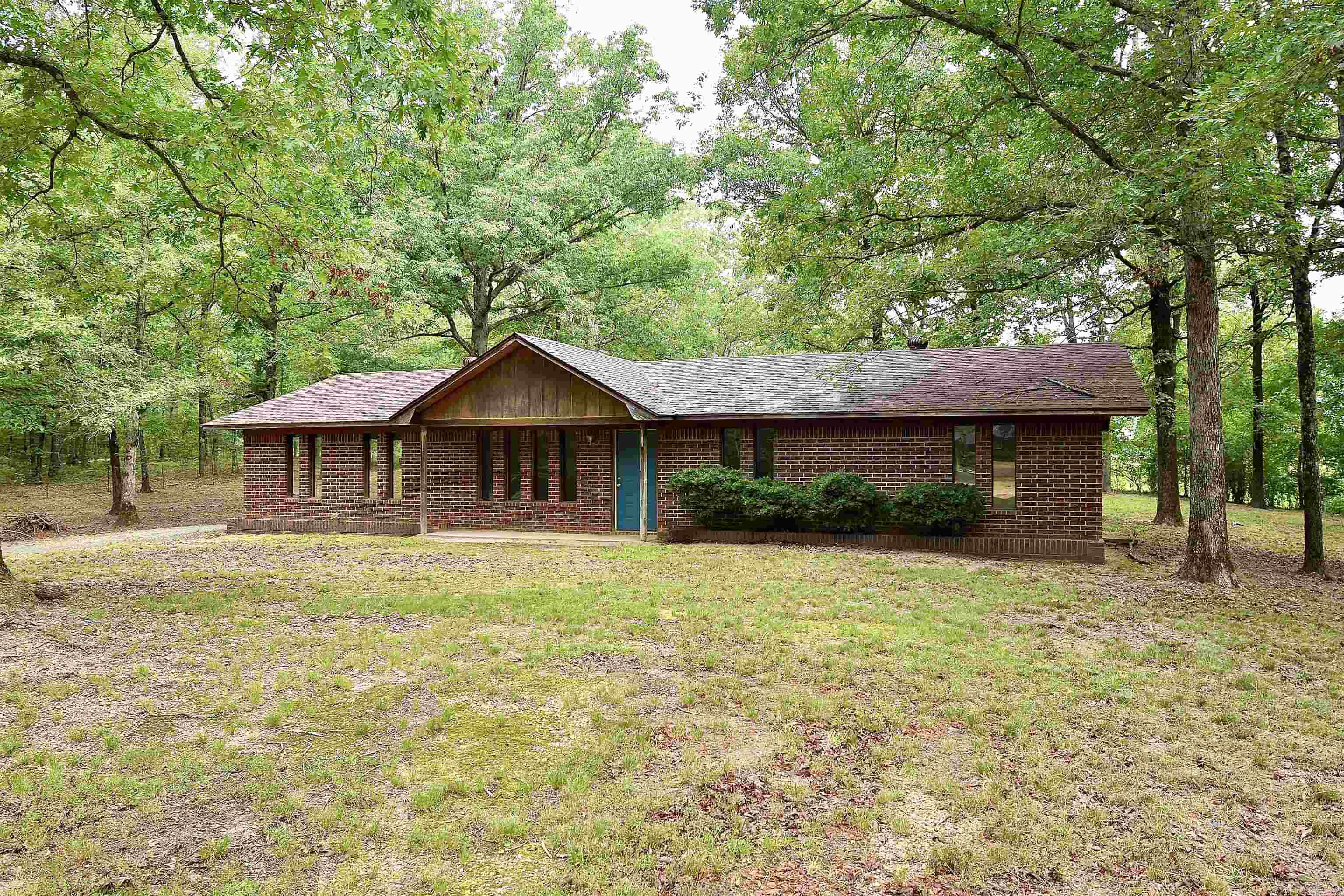 Welcome to 186 Rolling Oaks Dr, a beautifully maintained home nestled on a spacious 1.04-acre lot with mature trees offering privacy and a peaceful setting. While conveniently located only 10-minute drive outside of Malvern. This 3-bedroom, 2-bathroom home features an open-concept layout that seamlessly connects the kitchen, dining, and living areas. Tall ceilings in the living room create a spacious feel, perfect for everyday living or entertaining guests. The kitchen is equipped with brand-new appliances, including a stove, microwave, and dishwasher, and features a bar for casual dining. The home also includes a dedicated laundry room, a two-car garage, and a 10x16 storage shed for all your tools and outdoor equipment. Make your way outside on the front porch to take in the calming scenery. Enjoy the peace of country living while still being close to town. Do not miss your opportunity to make 186 Rolling Oaks your own!