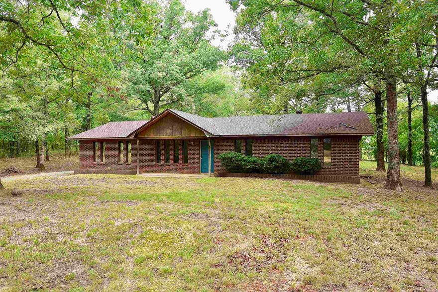 Welcome to 186 Rolling Oaks Dr, a beautifully maintained home nestled on a spacious 1.04-acre lot with mature trees offering privacy and a peaceful setting. While conveniently located only 10-minute drive outside of Malvern. This 3-bedroom, 2-bathroom home features an open-concept layout that seamlessly connects the kitchen, dining, and living areas. Tall ceilings in the living room create a spacious feel, perfect for everyday living or entertaining guests. The kitchen is equipped with brand-new appliances, including a stove, microwave, and dishwasher, and features a bar for casual dining. The home also includes a dedicated laundry room, a two-car garage, and a 10x16 storage shed for all your tools and outdoor equipment. Make your way outside on the front porch to take in the calming scenery. Enjoy the peace of country living while still being close to town. Do not miss your opportunity to make 186 Rolling Oaks your own!