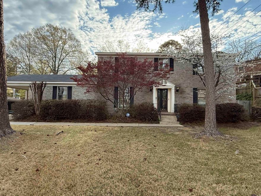 Traditional two-story, 4 bed 3. 5 bath charmer. Situated on a beautiful lot on a coveted street in Midtown. Picturesque back yard with a pool and fully screened back porch.