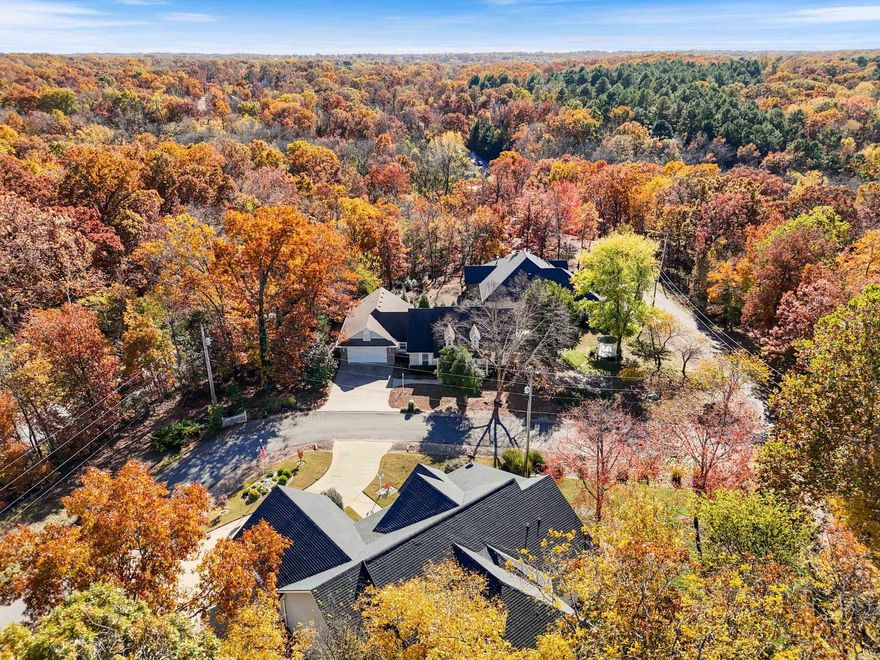 Brand new roof just installed! This charming home located in the Highlands sits on a desirable flat and oversized corner lot. Located near lake Loch Lomond, Scottsdale golf course, mountain bike trails, and Tanyard Creek. This home features 3 bedrooms and 2.5 bathrooms, a formal dining room, breakfast nook, gas fireplace, custom sky tubes to add natural light, and stunning scraped hardwood flooring. Step outside to the large covered deck with a low maintenance, fenced back yard.The side lot includes picturesque landscaping, complete with a gazebo. The attached garage includes a workshop area with extensive built-in cabinetry for storage and projects. This home has been meticulously cared for and maintained and is ready for its new family. Schedule your showing today!