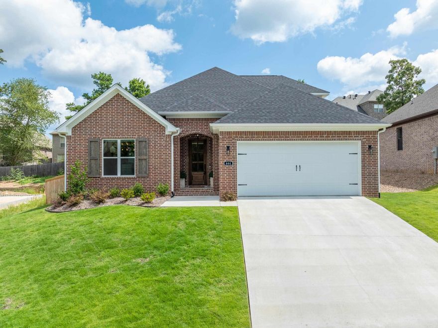 Welcome to this STUNNING home nestled in the highly sought after Chenal Valley Epernay Place Subdivision. Built in 2023 by Eric Ward Construction, this 2,575 square foot home features 3 bedrooms and 3 bathrooms with so many extras. As soon as you walk in you are welcomed into the foyer leading to an open-concept floor plan where the great room, kitchen and separate dining space are seamlessly intertwined. The gourmet kitchen features beautiful solid surface countertops, stainless appliances, a spacious island with bar stool seating and a walk-in pantry. Tucked away for privacy, the primary bedroom suite offers a spa-like bathroom boasting a his and her vanity sinks, soaking tub, and spacious, custom tile shower. The second bedroom is located on the main level with ensuite bathroom. The third guest bedroom located upstairs comes with plenty of room to expand featuring its own ensuite bathroom as well. The covered patio overlooking the fully fenced back yard is perfect for entertaining.  Additional features include an office, two car garage, tankless water heater, outside storage area off the back porch and new window treatments. This home is walkable to the neighborhood pool!