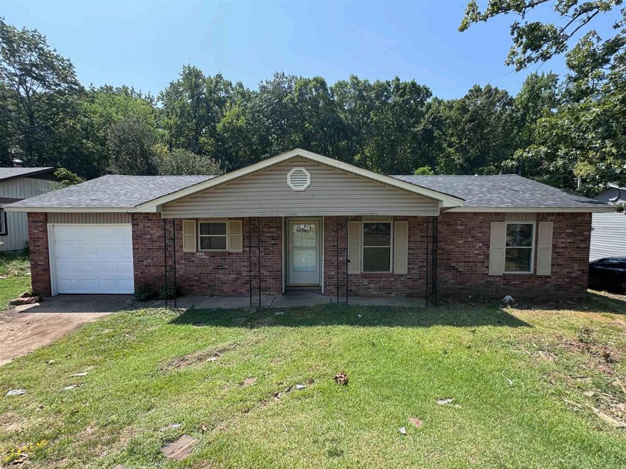 Check out this cute brick home in a quiet neighborhood in North Little Rock.  Recent updates include a new roof, floors, refrigerator, paint and HVAC.  A garage, fenced in back yard and half bath in the primary bedroom make this an ideal starter home or great for investors looking for a ready to lease property! Come see it today!