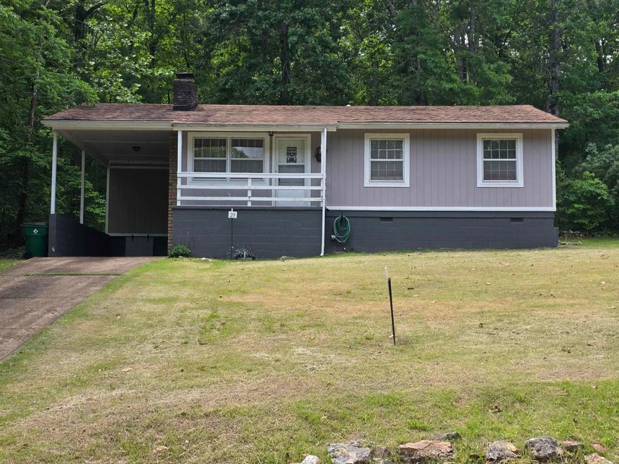 Great location for this very cozy, 2-bedroom, 1 and a 1/2 bath home. Home comes with fairly new laminate floors. All appliances stay. Some furnishings stay or can be removed. New roof, new siding, new interior paint and new flooring 2018. New AC was installed in 2019 and a new furnace in 2021. The large living room could be used as living/dining, or the large kitchen can be an eat-in kitchen. Sliding glass doors in the kitchen lead out back to a nice, covered cement patio and the carport storage, as well as the separate storage building or shop/she-shed. Architectural shingle roof. AWP installed new insulation in the attic and a vent fan in the Primary En-Suite bathroom in 2024. Updated septic tank, storm windows for energy savings and a beautiful built-in Sandstone fireplace that has been painted and piped in for gas logs. Cart distance to the North Golf course and the beautiful Southfork River. Cherokee Village property owners have access to 7 wonderful lakes, 2 beautiful 18-hole golf courses. The Thunderbird Center and of course the Southfork River. Come take a look at your new home, vacation getaway or retirement home today.