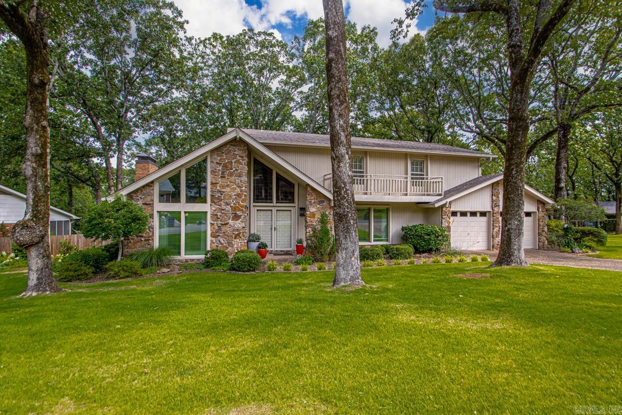 Welcome to this impeccably maintained 1970's mid-century gem, perfectly blending classic architectural character with modern comforts. Situated on a quiet cul de sac, this move-in-ready home offers peace of mind and stylish living with recent upgrades completed over the last four years. An updated kitchen with ample storage, ideal for both everyday living and entertaining. Energy efficiency and comfort were top of mind with recent improvements, including a new roof, energy-saving Low-E windows, new patio doors, and added attic insulation. Also a new HVAC system for the downstairs. With timeless mid-century charm and abundant natural light, this property is a rare find that's truly move-in ready.