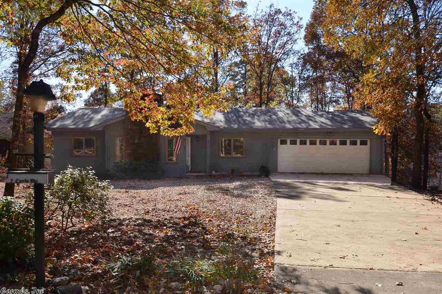 Great lake home with lots of updates. No carpet home, laminate and tile in the wet areas. Great study with built-ins also room for a day bed to give that extra room that you might need for those guest.  Kitchen has a great view of the lake .  Spacious screened porch that over looks lake and large wooded lot. Largest lot in the area. New roof in 12, also has a updated master bath. This is one you really need to see just can't tell you what a buy this one is. Pontoon boat included, new stove & d/w.