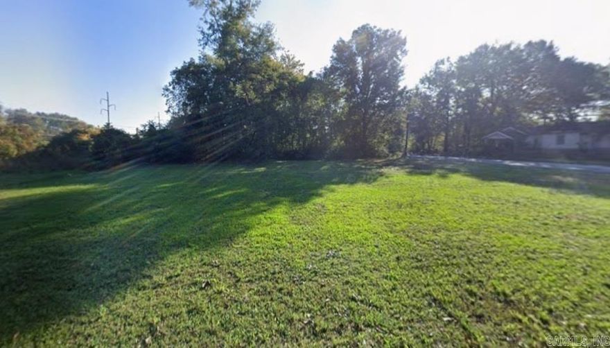 Build a new home on this .18 (+/-) acre corner lot in Pine Bluff of Jefferson County. It is flat and cleared, close to local amenities, close to the Arkansas River and Lake Saracen. Manufactured homes are not allowed. Owner financing is available. Property conveys a Limited Warranty Deed. Call or text for more information.