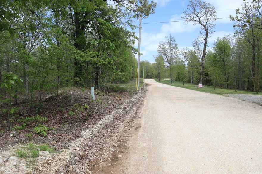 Ozarks Wooded acreage for sale near Salem, AR. Property is located on Old Ridge Rd. at Sturkie, AR. This all wooded tract has mainly hardwood timber. Small seasonal branch. There are building sites on the property. It has county road frontage with rural water and electricity available. It is located just off of paved county road. There is marketable timber on the property. Property was recently surveyed. Plenty of wildlife, including deer and turkey.