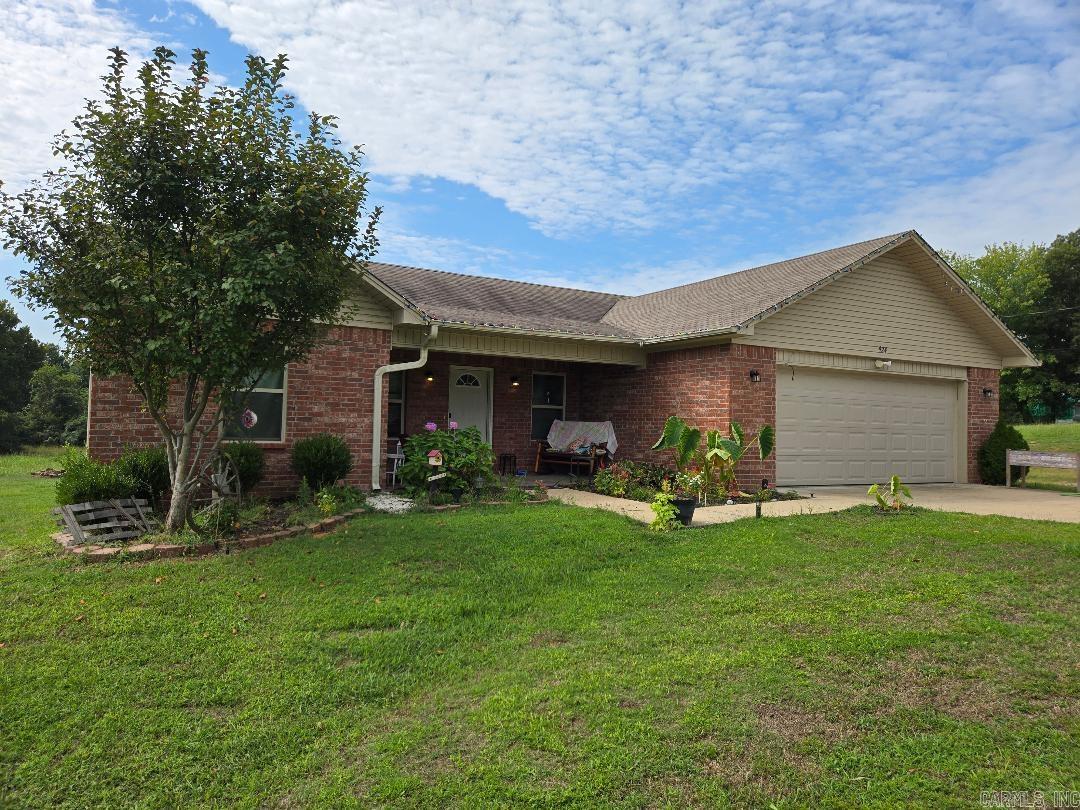 Newer home in the Lamar school district that is on 1 acre. With concrete floors you can add a rug or put new flooring down to your style. Open floor plan with the living room opening up into the dining and kitchen. Enjoy sitting on the back deck watching the wildlife come out of the tree line. The house is near the Lamar schools, making it convenient for teachers, coaches and students. Call today for your showing. Occupied and needs notice for showings.