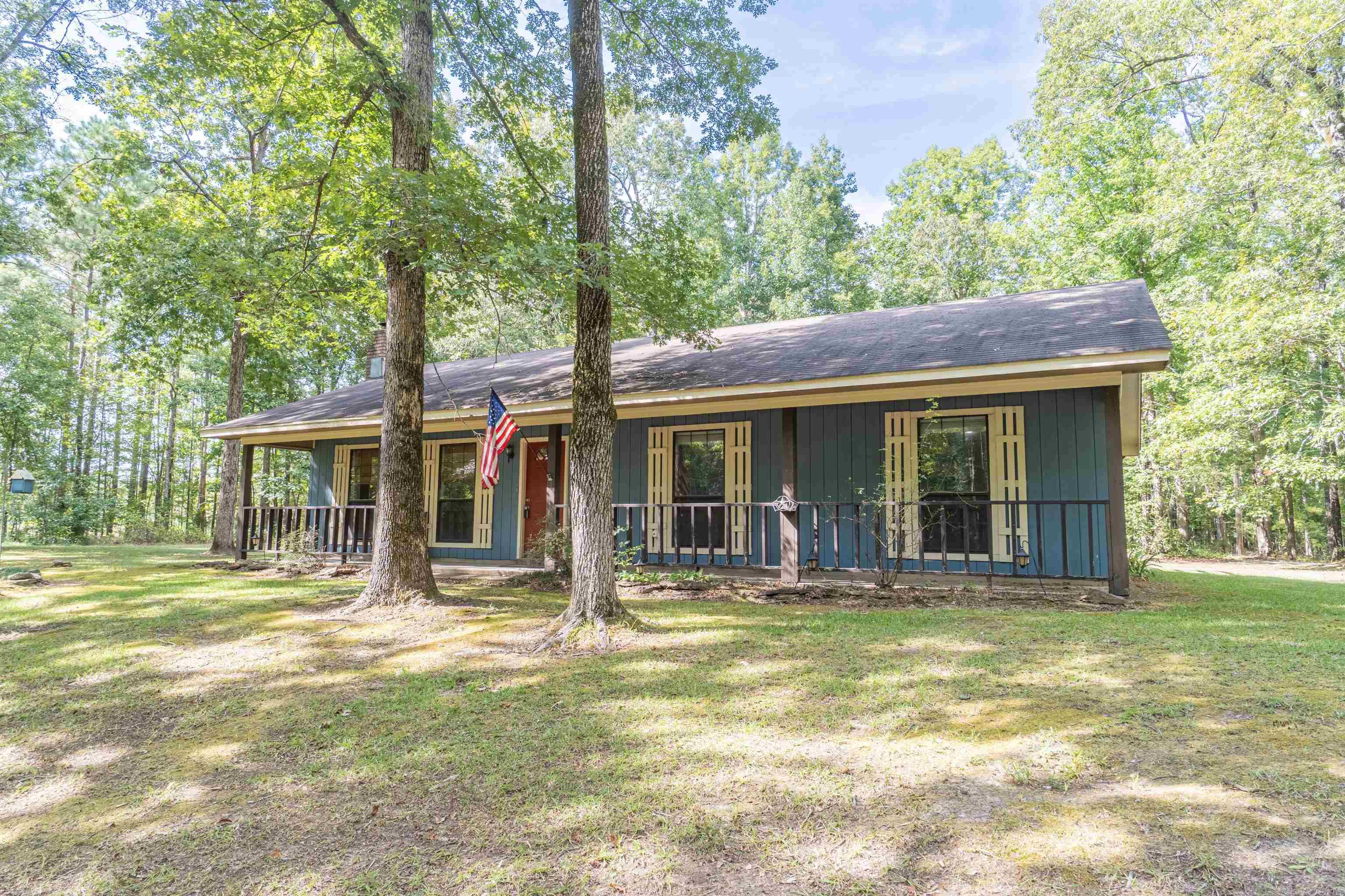 Welcome to this charming 3 bed, 2 bath well maintained home perfectly situated on almost an acre of land, offering both space and privacy. Step inside to find an inviting layout with granite countertops, modern finishes, and plenty of natural light throughout. Outdoors, enjoy the expansive yard that's ideal for entertaining, gardening, or simply relaxing in your own slice of country living. This home offers the perfect balance of comfort, style, and space. Don't miss your chance to make it yours!
