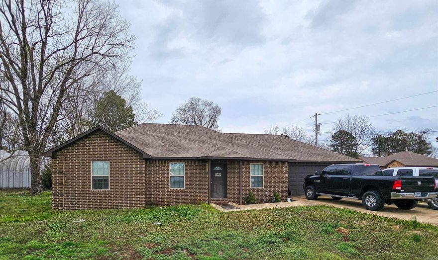 On a corner lot in Brookland is where you will find this one-level, traditional style, brick home with 3 bedrooms & 2 full baths. Floor plan includes a large great room with tray ceiling, eat-in kitchen, and laundry room. Acid-stained concrete floors throughout. Master also features tray ceiling and private bath with double vanity.  No Seller Property Disclosure will be provided. Legal Description: Lot 3 Barker Brothers Replat of Lot 1 of Town Lots of Brookland, city of Brookland, Craighead County, AR.