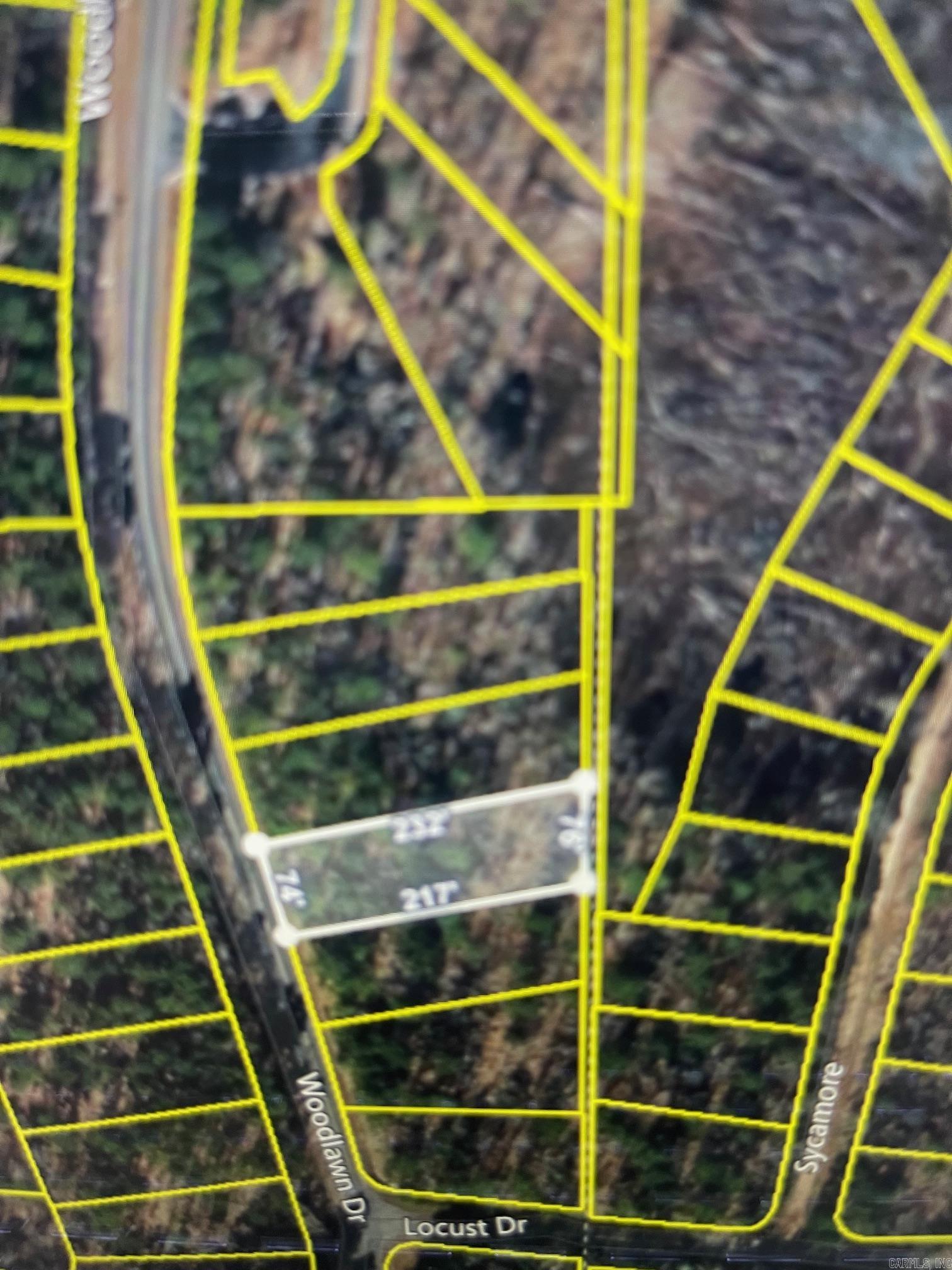 Welcome to your own slice of paradise in beautiful Fairfield Bay, Arkansas! This spacious double lot with partial lake & mountain views offers the perfect opportunity to build your dream home in one of the most desirable locations in the state, with access to a wealth of amenities. Just minutes away from stunning Greers Ferry Lake. Whether you're an avid fisherman, boater, or simply enjoy relaxing by the water, this location has something for everyone. But that's not all Fairfield Bay also offers a wide range of amenities to its residents, including 3 swimming pools, 2 18-hole golf courses, hiking and biking trails, ATV/UTV trails, pickleball and tennis courts, and a full-service marina. Whether you're looking for outdoor adventure, a friendly game of tennis, or a relaxing day by the pool, Fairfield Bay has you covered. The lot itself is generously sized and offers plenty of room for your custom-built home, as well as any additional amenities you desire. With easy access to utilities and services, including water, sewer, and electricity, you'll have everything you need to make your dream a reality. Buyer to pay all closing costs and title insurance. See agent remarks.