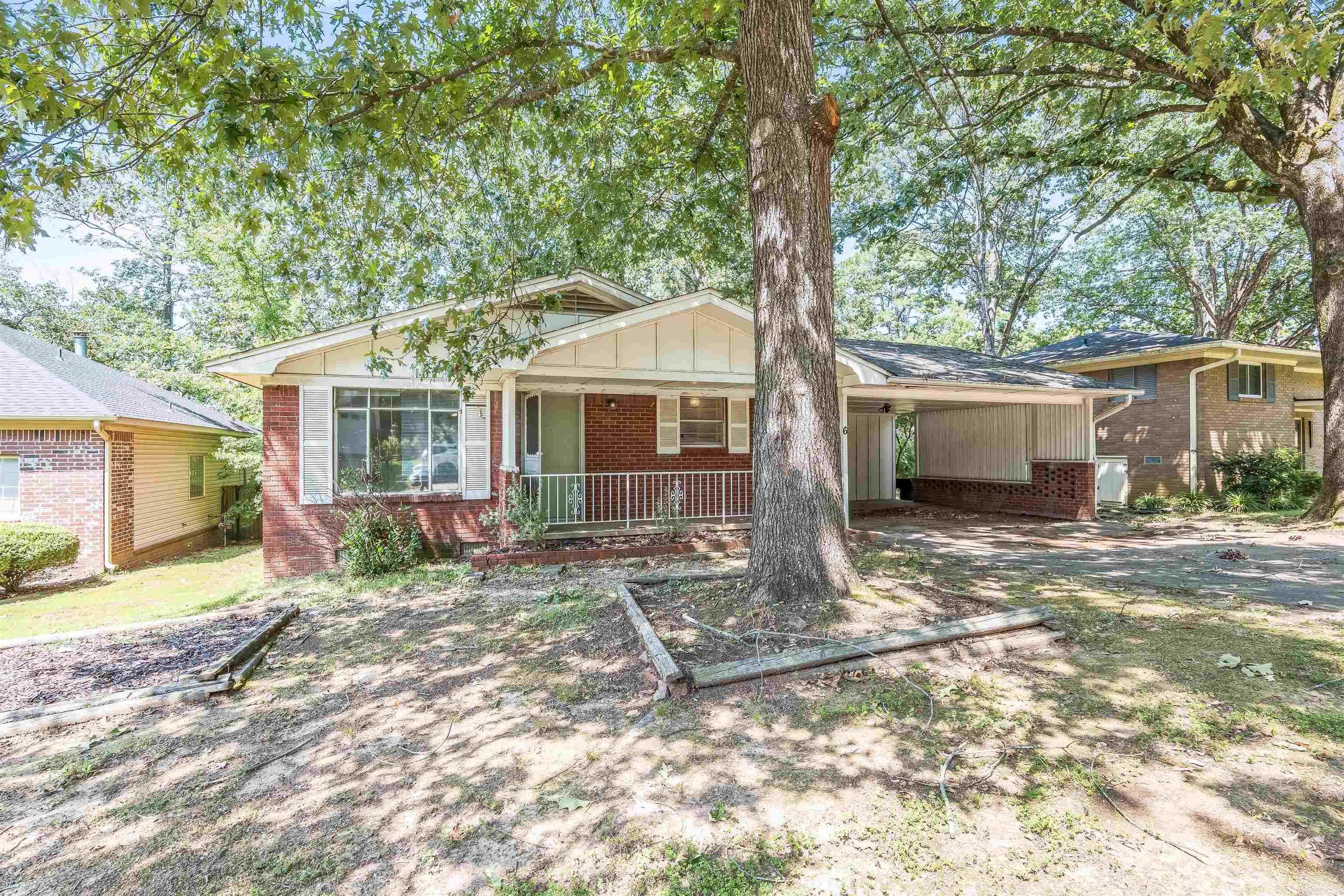 6 Gregoy Lane is an all brick, ranch style home located in the heart of the Briarwood subdivision, with easy access to all of Little Rock. The home was built in the early 1960s and offers the classic ranch-style 3/1.5 floor plan that provides an opportunity for straightforward updates. Features include a private yard with mature trees, carport bonus room, and a large, open kitchen floor plan. The front living room has large windows, and the floor plan lends to family living, roommates, or a potential rental proprty. Briarwood is a quiet, peaceful neighborhood - close to everything Little Rock offers. The location is near mid-town and Park Plaza, with 630 on-ramps nearby, Chick-fil-A, target, UAMS, War Memorial Park, and many more amenities.