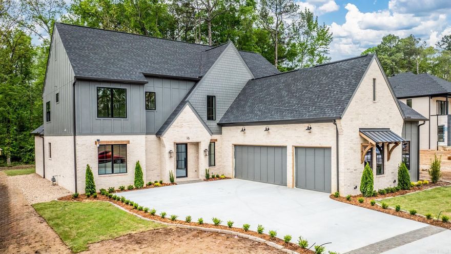 Contemporary modern and timeless design collide in this one of a kind two story custom by Willmark Homes. From the hidden pantry to hide those small appliances, white oak accents, waterfall island, and high end finishes, the details are unparalleled. With just over 5,000 square feet, five bedrooms, 4 1/2baths, an office and a bonus room for those family movie nights, the options really do feel endless. Tucked away in Chenal Valley’s newest gated community, Mereville Place offers private golf cart access to the golf course and is just a few steps away from the shopping and restaurants at the Promenade.There’s so much more that could be said about this home but we think it’s best discovered in person and we’d love to show it to you. Reach out and let’s schedule your private tour of 16 Mereville Place. Welcome home.