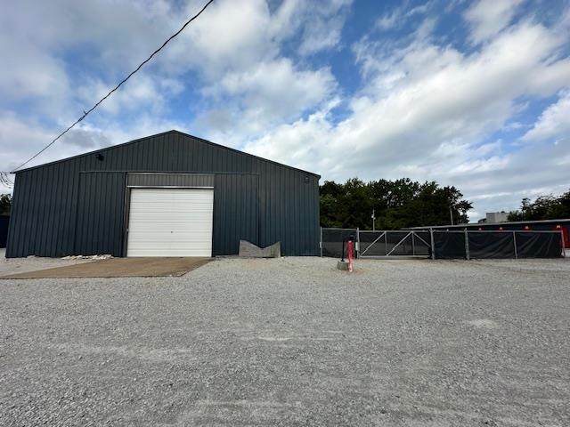 ***Lease price is negotiable with longer lease terms*** Located within the secure NEAMods facility, check out this large warehouse with 7,200 +/- sq ft of interior space PLUS a gated, 6,600 +/- sq ft lay down yard...Talk about space for days! Warehouse features large, powered overhead door, fluorescent lighting, office space, loft style storage over the office space, and SO MUCH ROOM! Outside lay down yard is spacious, fully fenced with 6' privacy screened chainlink fencing, features a secure keypad automated entry system and is perfect for storing work vehicles overnight, trailers, job materials or anything your business needs!