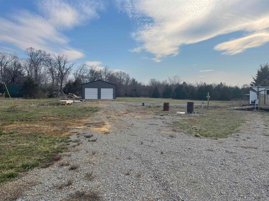 IF YOUR LOOKING FOR COUNTRY SETTING LOOK NO MORE APPRX  5.03. THERE IS A CREEK AT BACK OF PROPERTY, ALL UTILITIES ARE THERE AND A NEW METAL BUILDING 24X30. CALL TODAY  FOR A SHOWING