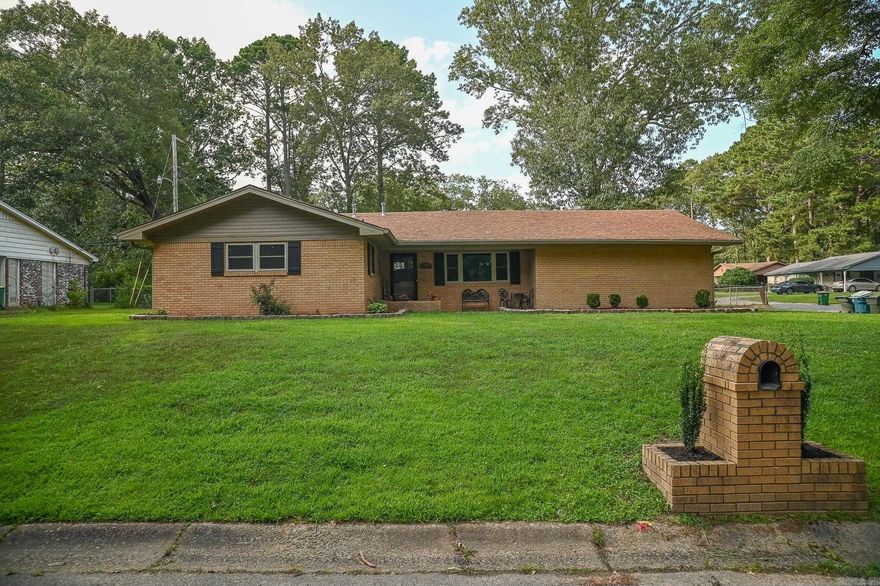 Charming Brick Home on a Spacious Corner Lot!!  Welcome to this beautifully maintained 1298 sq ft. brick home, perfectly situated on two generously sized lots. Offering both space and modern updates, this home is truly move-in ready. Inside, you'll find new flooring, fresh paint, roof and water heater less than 3 years old and a brand-new AC unit.The spacious laundry offers versatility and could easily double as a home office. A newly built shed less than 2 years old adds valuable storage to the property and a two-car garage perfect for extra storage. Enjoy peace of mind with updated plumbing and relax in the screened in back patio, perfect for outdoor comfort in any season