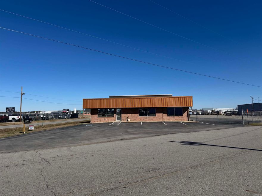 This office underwent a complete update and renovation in 2005. The office area is 3701 square feet. This space features 11 offices, a conference room, a spacious reception area, three restrooms, and a kitchen. This location is visible from the I57.