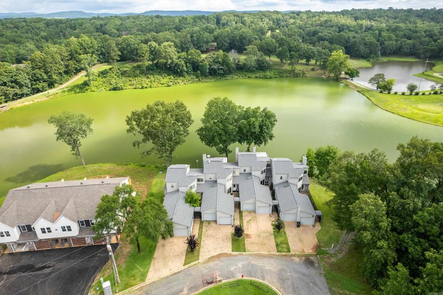 Vista View across a large pond with a fairway beyond. One of only four condos in Pebble Beach HPR. Very well maintained unit, list of maintenance & upgrades since owner purchased in 2012 available upon request. list includes, heat & air, doors, windows & roof (roof POA 2020) Courtyard entrance. One step from garage into condo. Kitchen, dining, living, master & utility closet on main level. Custom cabinets, built ins, gas log fireplace (propane) The partially covered deck with view is very relaxing. No STR per insurance requirements. Abundant storage in crawl space. No boating allowed on the pond, fishing is allowed. Located in Diamondhead with all it's amenities.  Area amenities include an 18 Hole PGA sanctioned golf course, clubhouse with restaurant, banquet room, workout facility, Olympic size swimming pool and tennis/pickleball courts. Please visit diamondheadcommunity.com  Diamondhead POA $1300 annual, Pebble Beach HPR POA $163 monthly.