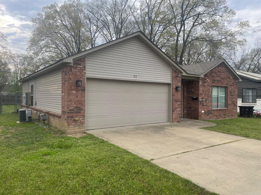 Beautiful 3-bedroom, 2-bath home in a fantastic location, just minutes from interstate access, shopping, dining, and downtown Benton. Also conveniently located near Hot Springs and Little Rock. The open floor plan features a large living area as well as a stunning kitchen with quartz countertops and wood-look vinyl plank flooring throughout (except bedrooms). New flooring, and a new roof add to the home’s appeal. New microwave. Enjoy a large, fully fenced backyard perfect for relaxation or entertaining. Also floored attic for additional storage.