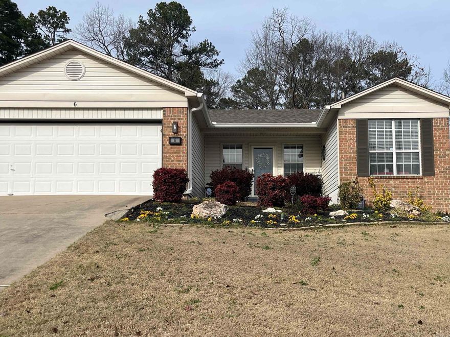 Welcome Home! This beautifully updated 3-bedroom, 2-bathroom home offers 1,348 square feet of comfortable living with modern touches throughout. Step inside to a spacious living room with vaulted ceilings that create an open, airy feel. The kitchen features a convenient breakfast bar, newer appliances, and a dedicated dining area—ideal for everyday meals or entertaining guests. Enjoy peace of mind with recent updates, including a new roof (2022), new interior paint, and a hot water heater replaced in 2018.  Outside, you’ll find a fully fenced backyard complete with a patio and cozy fire pit—ideal for relaxing evenings or weekend gatherings. A two-car garage adds practicality and extra storage. Located in a welcoming neighborhood, this home combines modern comfort, style, and convenience—all waiting for you!