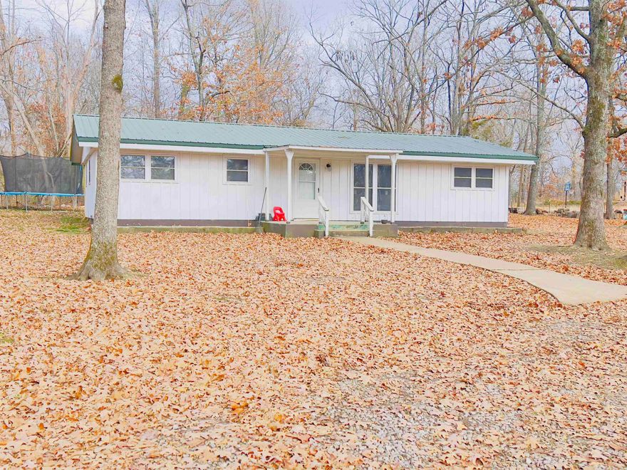 Charming Home in the Heart of Small Town Horseshoe Bend, Arkansas  This 4 bedroom, 1 bathroom home offers a generous living space of 1,152 square feet, adorned with vinyl plank flooring, an open floor plan, a metal roof, and NEXT high speed internet available. Located in the Tract D Subdivision of Horseshoe Bend, Arkansas, this residence is situated on two spacious lots, approximating 1.14 acres.    Why Horseshoe Bend?  Horseshoe Bend, Arkansas offers a unique lifestyle, combining the charm of rural living with the convenience of nearby attractions. From the Turkey Mountain Golf Course to the shimmering waters of Crown Lake, this location provides an array of recreational opportunities for the whole family. Enjoy easy access to local amenities while reveling in the peaceful ambiance of the countryside.   Don't miss the chance to make this house your home! Listed for only $84,900, this house won't be on the market long! Contact us today to schedule a viewing and experience what this property has to offer.