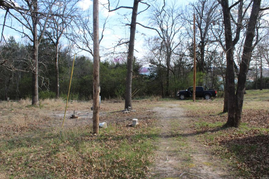 Great Opportunity Near Bull Shoals Lake – Lazy Acres Subdivision  Discover the perfect spot for your weekend retreat or forever home! This lot in the Lazy Acres subdivision offers easy access to Bull Shoals Lake, where you can enjoy boating, fishing, and a variety of watersports activities. With electric already on-site, and a hookup from a shared well and septic in place, this property is ready for your next adventure.  Whether you're looking to set up an RV for weekend getaways or build a cozy cabin, this lot provides endless possibilities. Plus, a boat slip is available with sale just minutes away, making it incredibly convenient to hit the water whenever you please.  If you're seeking a serene location close to the water, this property could be exactly what you're looking for. Don't miss the chance to own a piece of paradise near one of the area's most beloved lakes! DON'T MISS OUT!!!!