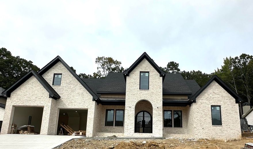 Welcome to 112 Bear Den Court, a stunning new construction home offering luxury, functionality, and timeless design in one of West Little Rock’s most desirable areas.  Step inside and experience an open-concept floor plan filled with natural light, high ceilings, and beautiful finishes throughout. The spacious living room flows seamlessly into a designer kitchen featuring custom cabinetry, quartz countertops, stainless steel appliances, and a large island perfect for entertaining.  The primary suite is a true retreat with a spa-inspired en suite bath, soaking tub, and generous walk-in closet. Three additional bedrooms provide comfort and flexibility for family, guests, or office space.  Upstairs, you’ll find a bonus room with a full bath and closet — ideal as a fifth bedroom, media room, or private guest suite.  Enjoy outdoor living on the covered patio, overlooking a private backyard ready for your personal touch.  This home blends modern luxury with everyday comfort, a perfect fit for families or anyone seeking a brand-new home built to impress.