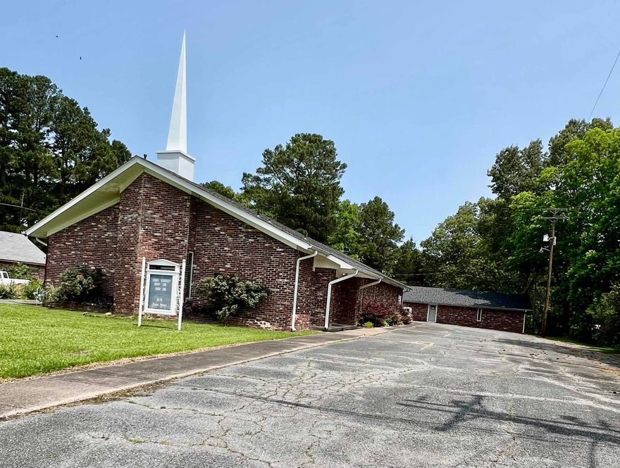 Previous church facility. Any use allowed by seller, check with city planning commission. Over 5k square feet combined space. 3300 SF sanctuary and classroom building and 1980 SF fellowship hall. Appointed offices, classrooms, storage closets, and fellowship hall with full kitchen. 4 restrooms. Asphalt parking. Property being sold as-is present condition. All showings must be accompanied by a Realtor. NO Disclosures provided by seller. Existing personal property will remain but will not be considered part of the sale.  Any items left in the building will be considered as-is and abandoned and will have zero value.  Seller makes no guarantees, warranties, or representations of any kind regarding the existence, condition, or usability of said personal property which will remain in building at closing. Title transferred by Special Warranty Deed/Trustee Deed.